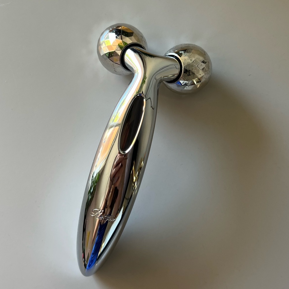 ReFa carat face roller with authorization card